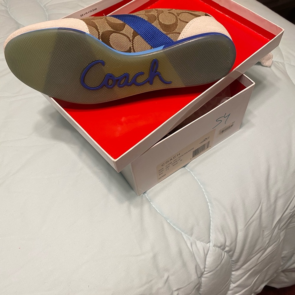 Brand new woman Coach shoes still in box
